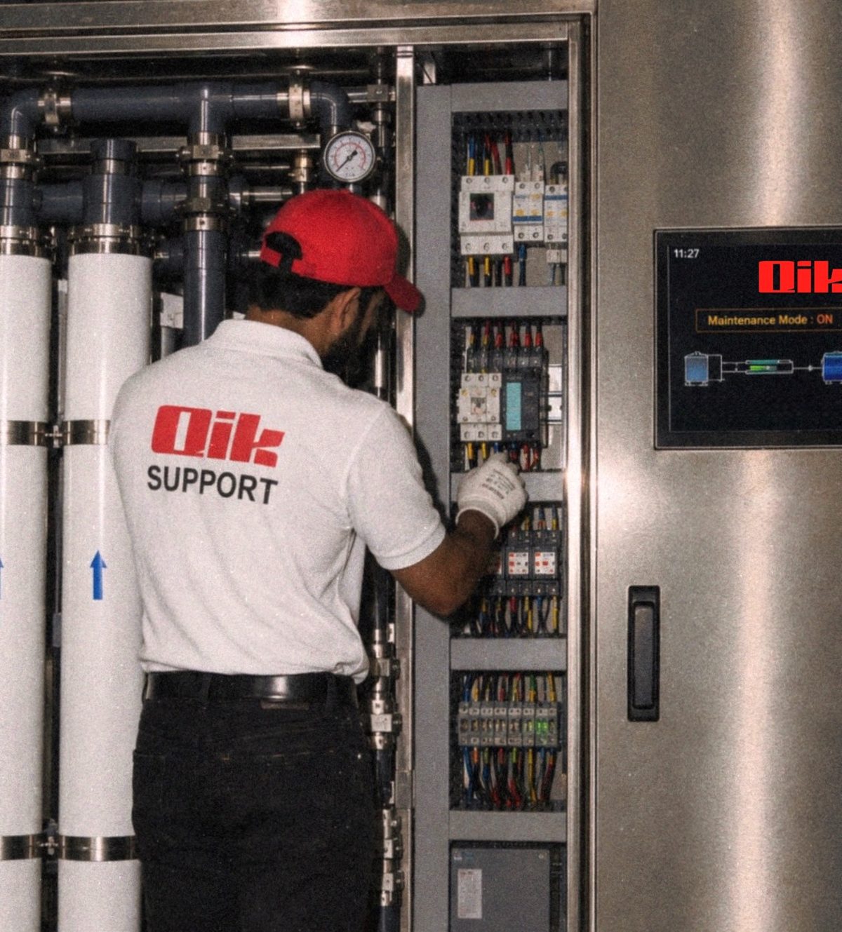 Qik technician working on industrial RO equipment